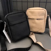 ESSENTIALS Unisex Trendy Crossbody Shoulder Bag - Stylish Minimalist Black & Beige Messenger for Everyday - View 1