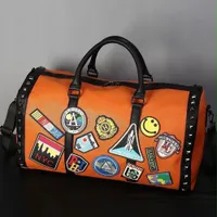 Vibrant Orange Patchwork Studded Travel Duffel Bag – Stylish Faux Leather Weekend Carryall for Trendy Explorers - View 2