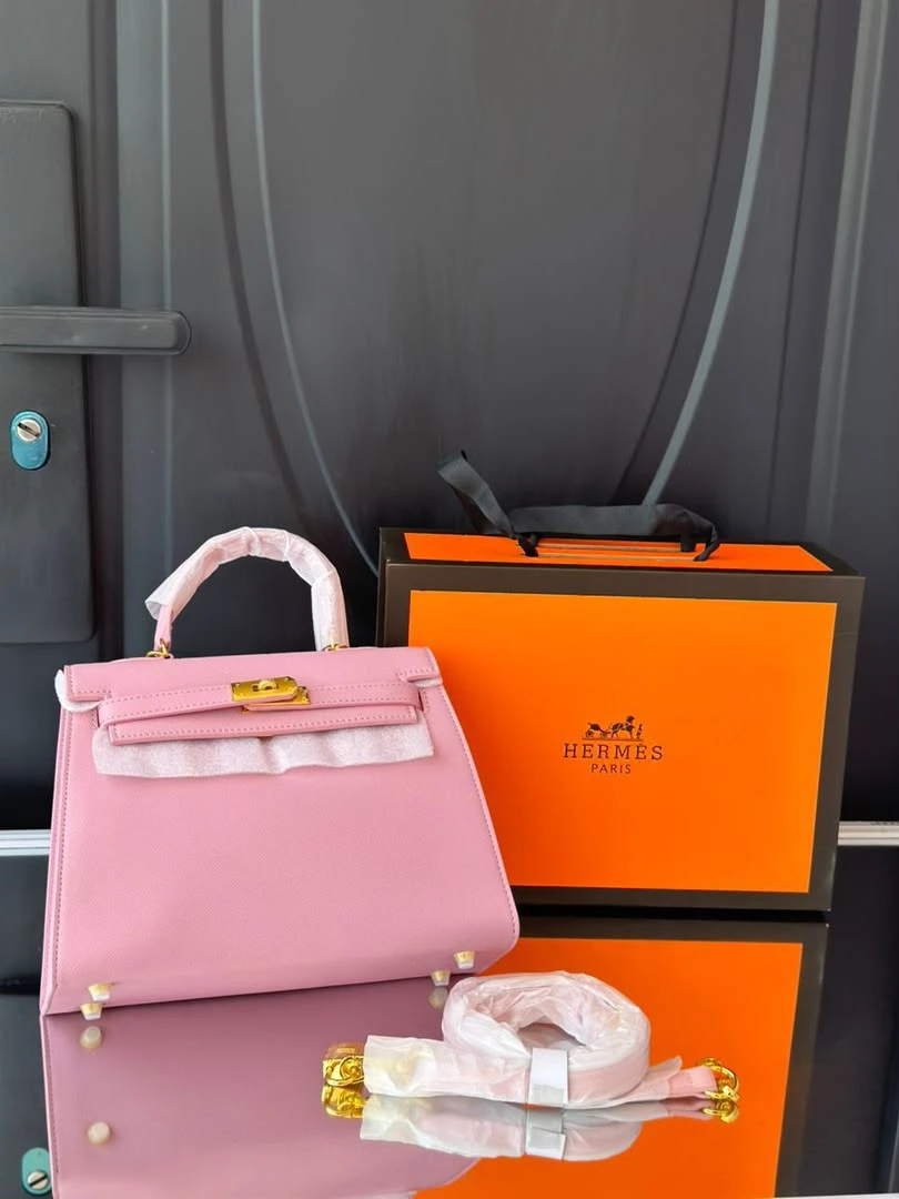 Women's Elegant Pink Structured Top-Handle Handbag with Detachable Shoulder Strap - Luxury Fashion Accessory for Ghanaian Style - Main View