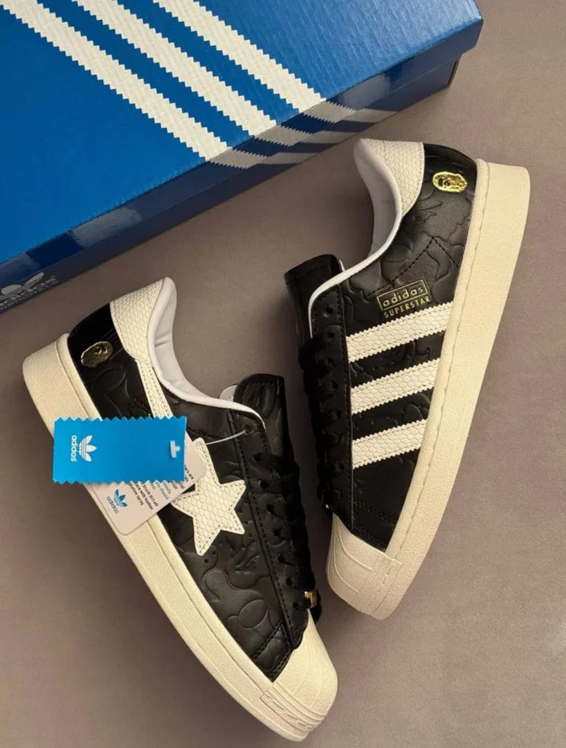 Unisex Adidas x BAPE Superstar Sneakers - Black & Cream Iconic Streetwear Collaboration Shoes with Ape Head & Star Details