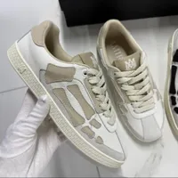 Original Amiri Skeleton Bone Low-Top Sneakers - Stylish Black and White Streetwear Shoes for Men - View 4