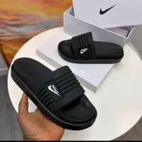 Nike Black and White Comfort Slides - Sporty Slip-On Sandals for Men and Women  Everyday Casual Footwear - View 2