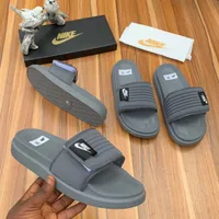 Nike Padded Comfort Slides – Stylish Grey and White Everyday Slippers for Relaxed Wear - View 2