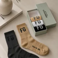 Fear of God Essentials FG Logo Unisex Ribbed Crew Socks 5-Pack Set- Premium Streetwear Comfort in Black, White  Khaki - View 1