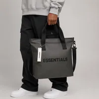 Essentials Unisex Dark Grey Water-Resistant Tote Bag and Modern Streetwear Carryall with Detachable Shoulder Strap Laptop Bag - View 1