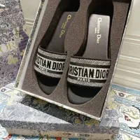 Women's Chic Black Leather Slip-On Sandals with Elegant Silver Buckle Detail - Comfortable Luxury Flat Slides for Everyday Style & Sophistication - View 4