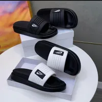 Nike Black and White Comfort Slides - Sporty Slip-On Sandals for Men and Women  Everyday Casual Footwear - View 1