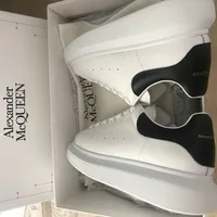 Alexander McQueen White Leather Oversized Sole Sneakers with Black Suede Heel Tab - Unisex Designer Trainers for Men & Women - View 2