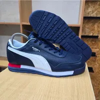 Puma Jogger Classic Blue and Black Leather Flat Sole Trainers Sneakers with White Stripe and Red Accent  - View 1