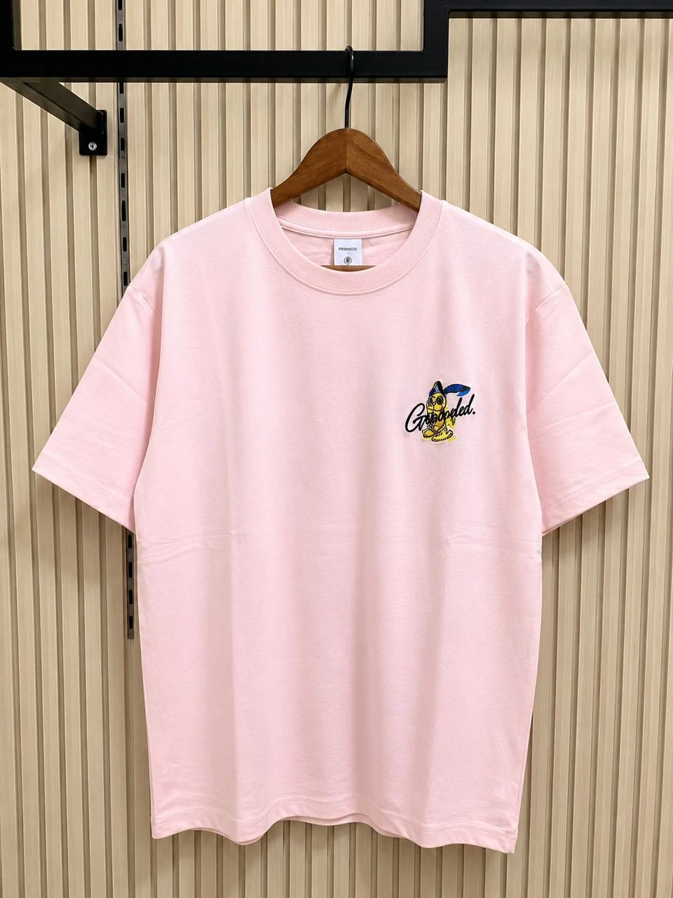 Unisex Loosely Tight Pocket T-Shirt with Colorful MOSHWAV Foundation Graphic - Stylish Crew Neck Tee for Modern Casual Wear