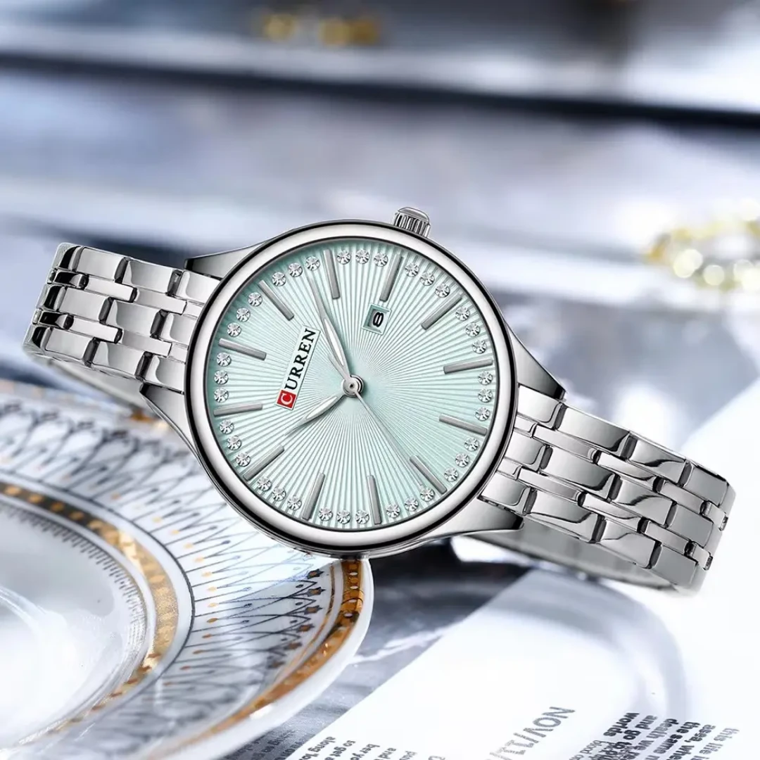 Elegant Women's CURREN 9099 Silver Stainless Steel Quartz Watch with Shimmering Crystal Markers  Date