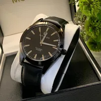 Movado Men's Datron Quartz Black Dial & Leather Strap Watch - Elegant Luxury Timepiece for Sophisticated Ghanaian Style - View 1