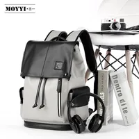 MOYYI Classic Unisex Stylish Two-Tone Grey & Black Flap Drawstring Backpack – Modern, Durable, and Versatile for School, Work, and Casual Adventures - View 1