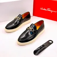 Men's Salvatore Ferragamo Black and Brown Leather Gancini Buckle Loafers - Easy Slip-On Shoes for Official Semi official and Casual Events - View 1