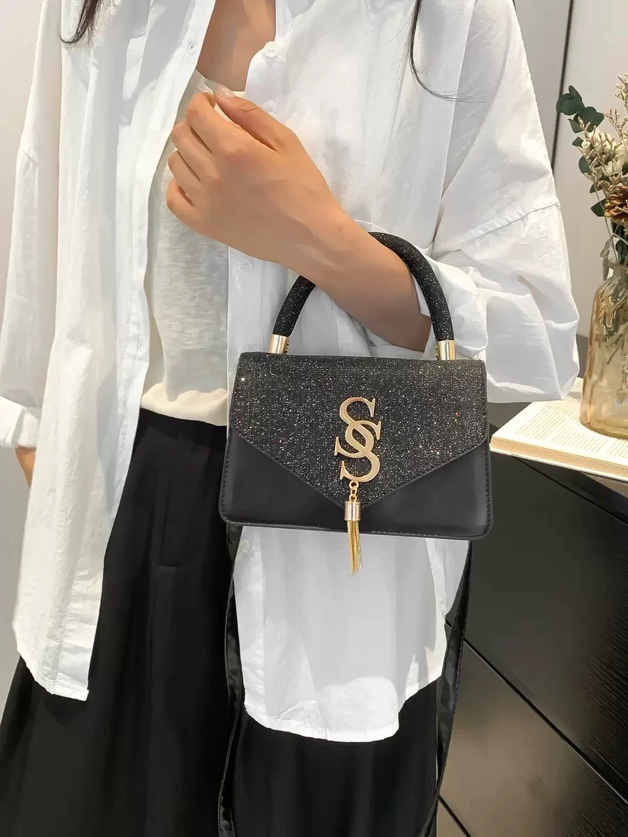 Women's Sparkling Black Glitter Top Handle Handbag – Chic Gold 'SS' Embellishment & Tassel Charm, Stylish Shoulder Bag