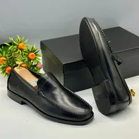 Clarks Men's Classic Black Leather Loafers - Premium Slip-On Formal & Smart Casual Shoes for Gentlemen - View 1
