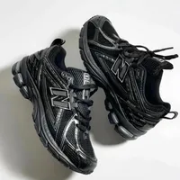 New Balance All-Black Athletic Running Trainers for Shoes Men and Women - Sleek, Comfortable Versatile Unisex Sneakers for Gym and Everyday Style - View 1