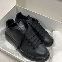 Alexander McQueen Unisex Black Leather Oversized Sole Sneakers - Premium Luxury Chunky Platform Trainers for Everyday Wear - View 3