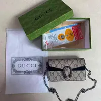 Women's Gucci GG Monogram Mini Shoulder Bag with Elegant Chain Strap & Iconic Dionysus-Style Buckle - Perfect Crossbody for Everyday Chic - View 1