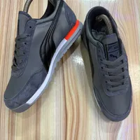Men's Puma Jogger Trainers Flat Sole Casual Sneakers - Dark Grey and Black Trainers with Suede Red Accents - View 2