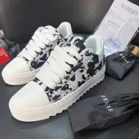 NUMERÍS Original Men's Statement Cow Print Low-Top Sneakers - Black  White Chunky Sole Fashion Kicks - View 1