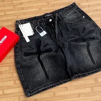 Men's Streetwear Washed Black Denim Jeans Shorts with Bold Abstract Cross Splatter Graphic - Relaxed Fit Distressed Jeans for Urban Style - View 1