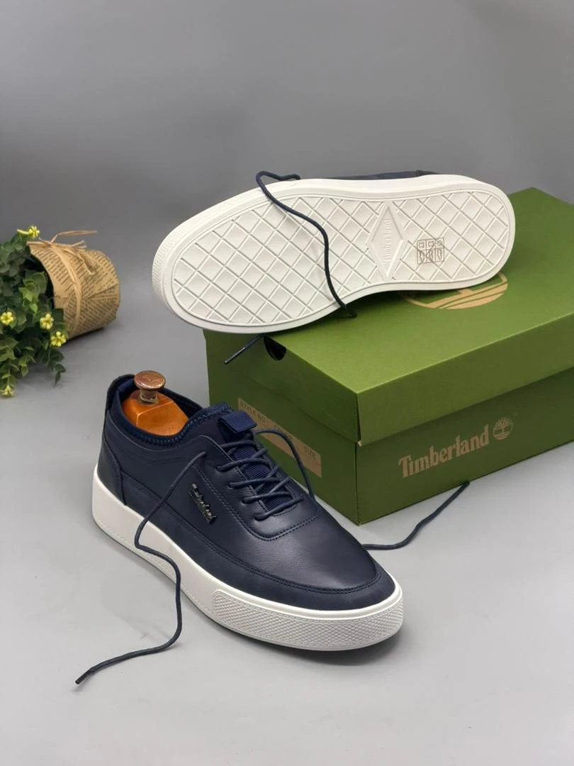 Men's Timberland Navy Blue Faux Leather Casual Low-Top Sneakers with White Sole - Stylish Everyday Comfort Modern Design - Main View