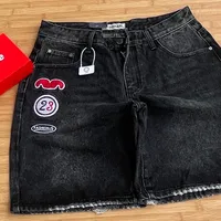 Men's Trendy Distressed Blue Denim Shorts with Artistic Paint Splatter Design - Stylish Casual Streetwear for Modern Youth - View 3