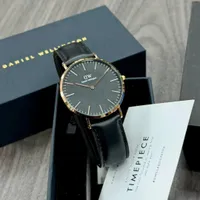 Daniel Wellington Classic Petite Men's Watch - Elegant Black Dial, Gold-Tone Case  Premium Black Leather Strap Timepiece for Men - View 1