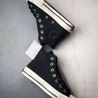 Converse Classic Black High-Top Chuck Taylor Sneakers Durable Canvas-Style Shoes for Everyday Comfort Timeless Streetwear Fashion - View 1