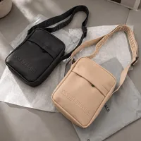 ESSENTIALS Unisex Trendy Crossbody Shoulder Bag - Stylish Minimalist Black & Beige Messenger for Everyday - View 2
