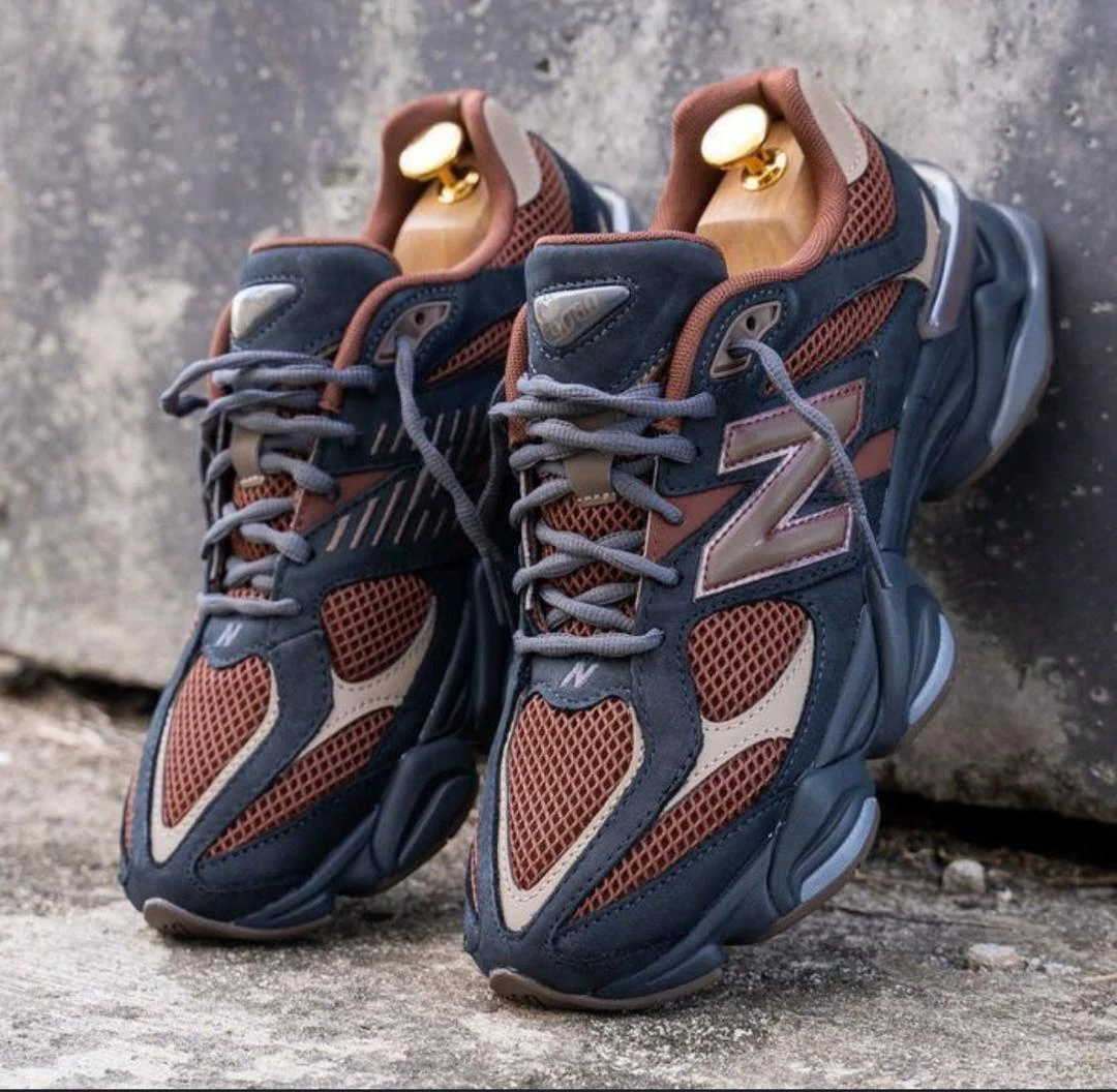 Unisex New Balance 9060 Dynamic Lifestyle Sneakers - Stylish Navy & Brown Chunky Trainers for Everyday Comfort & Trendsetters