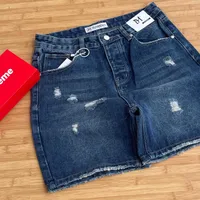 Men's Trendy Distressed Blue Denim Shorts with Artistic Paint Splatter Design - Stylish Casual Streetwear for Modern Youth - View 2