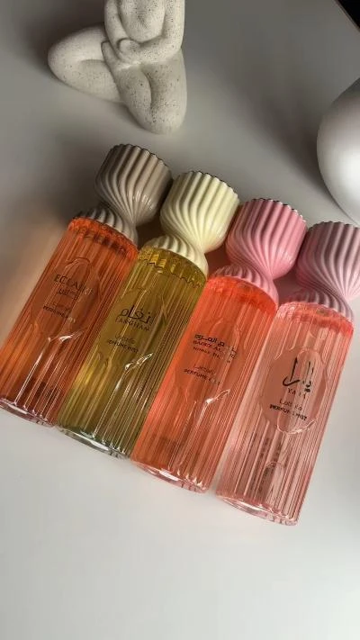 Women's Exquisite Scented Perfume Mists Collection - Eclair, Largham, Yalla & Baiy Al Arab Long-lasting Body Fragrances with Elegant Ribbed Bottles - Main View