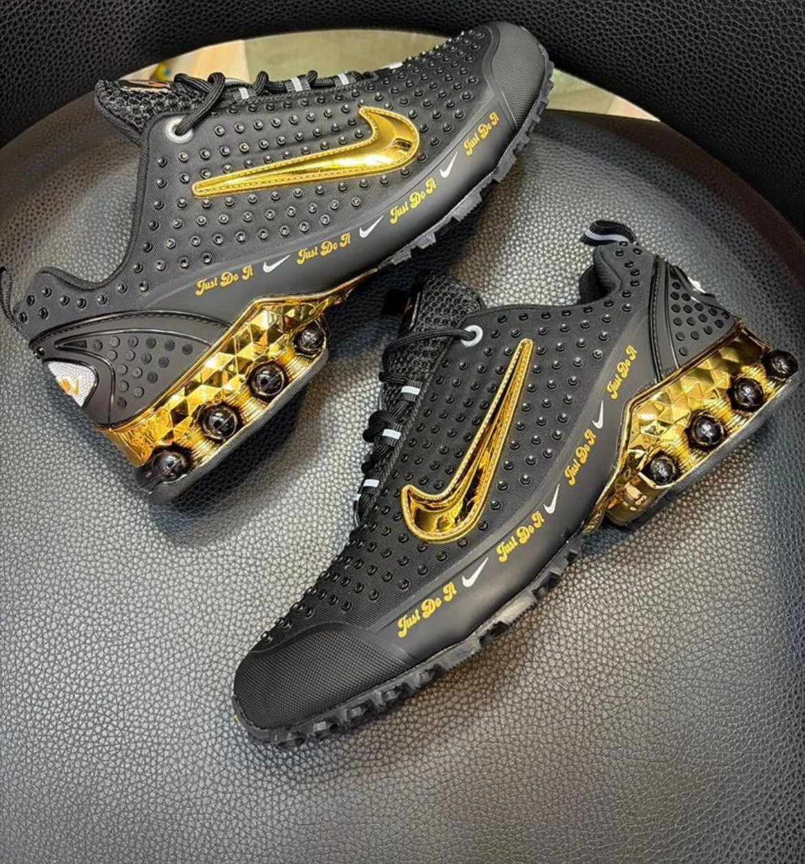 Unisex Black & Gold Luxury Studded Sneakers with 'Just Do It' Detail | Fashion-Forward Textured Trainers for Men & Women